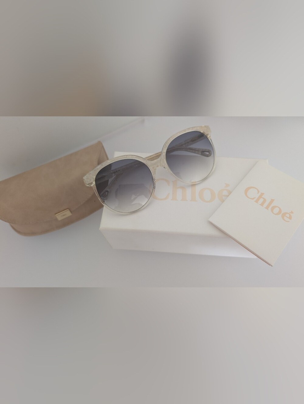 Chloé Round Sunglasses with Clear Beige Frames and Gradient Gray Lenses